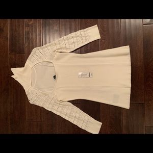 Bebe, off white open back sweater.